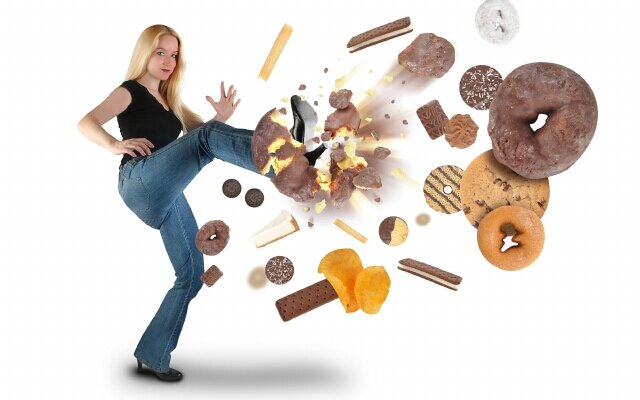 Diet Woman Kicking Donut Snacks on White